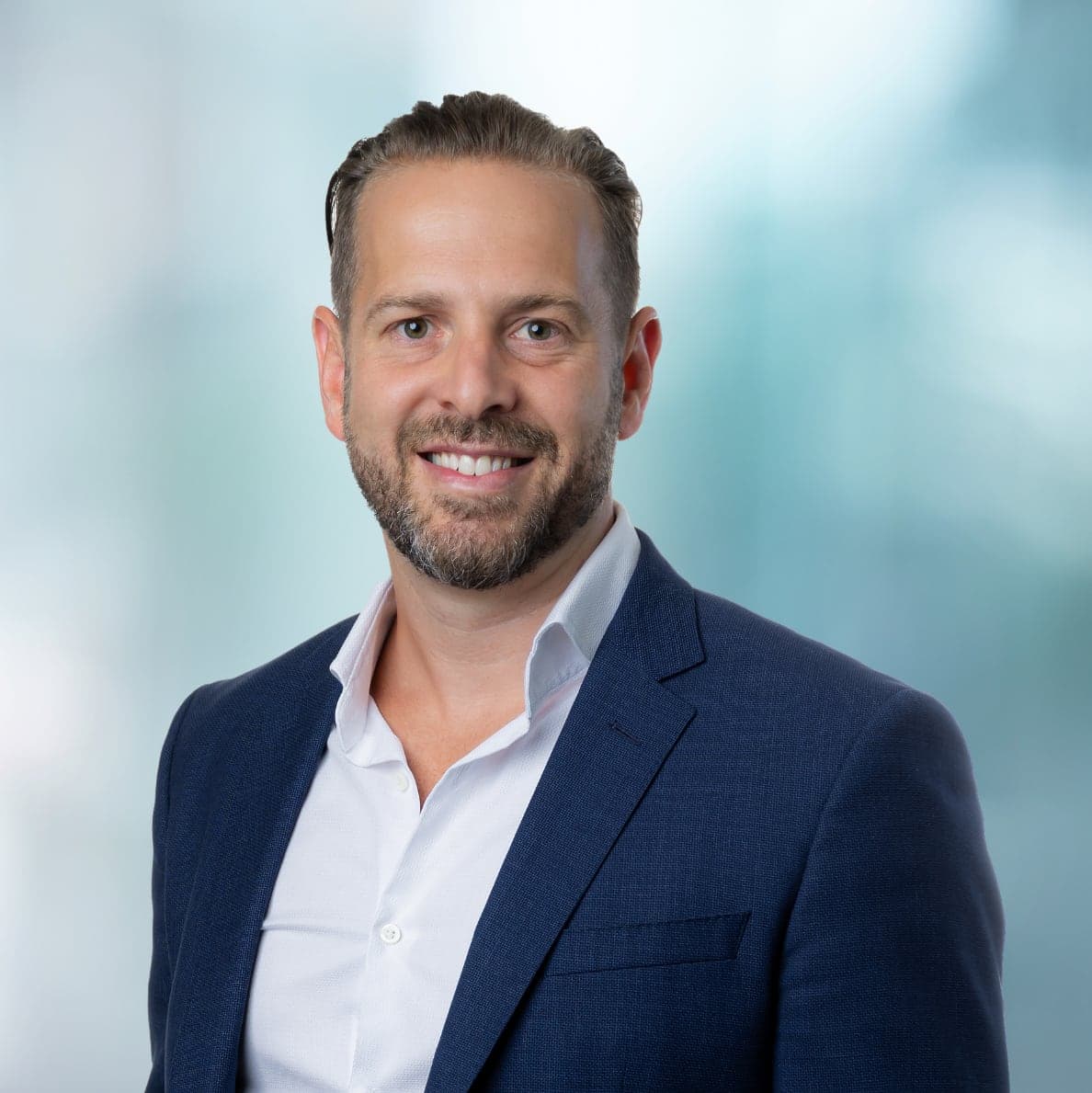 Portrait image of Dr Travis Falconer